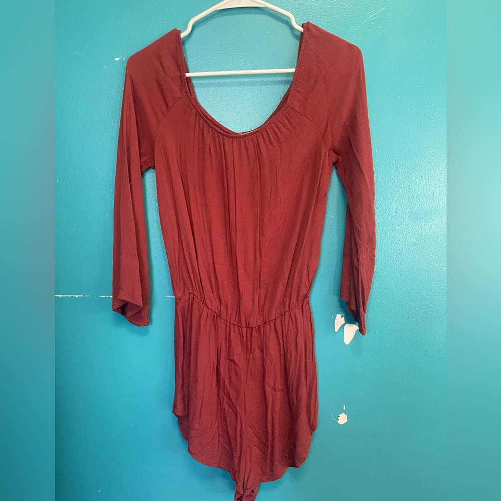 Dust red romper.
